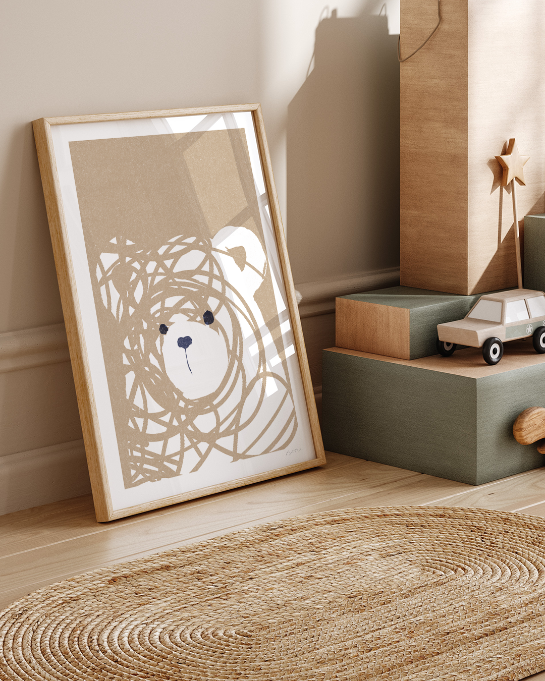 Framed Messy Bear print on timber floor beside a linen curtain