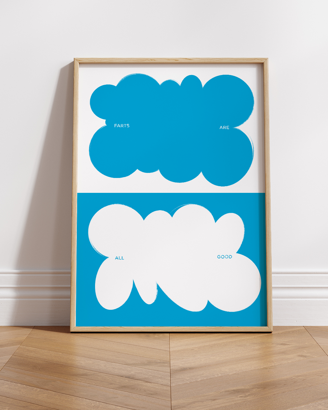 Bright blue Farts Art Print in white frame, styled on wooden ledge