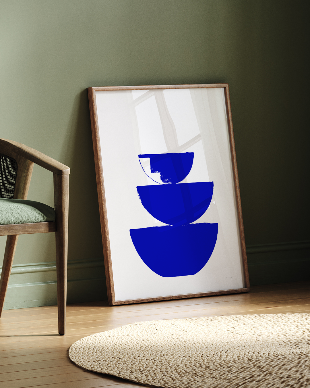 Bowls Art Print in a framed setting beside indoor greenery and sunlight